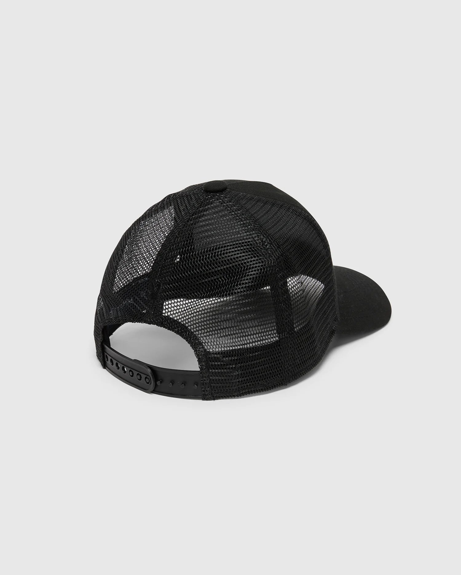 The image showcases the KIDS MELBOURNE GRAPHIC TRUCKER HAT from Psycho Bunny in black, featuring a solid front panel, mesh back, adjustable snap-back strap for a perfect fit, and an embroidered icon against the plain white background.