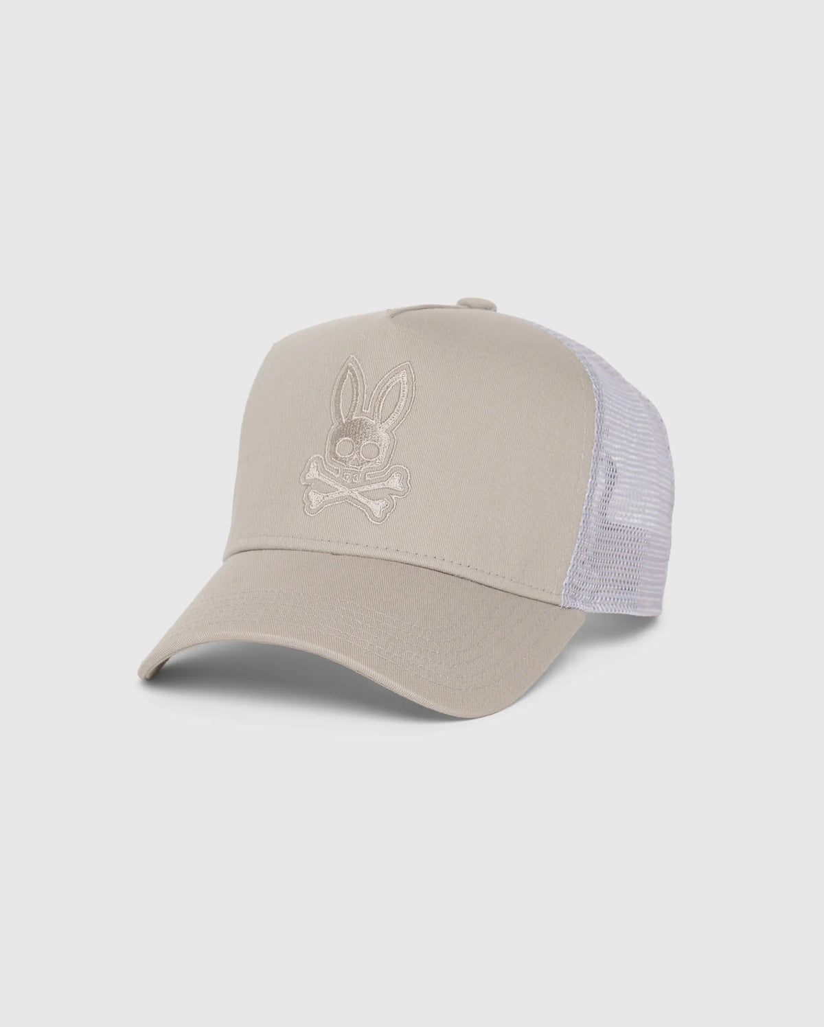 Here's a revised version that incorporates the product data:
A Psycho Bunny KIDS MALTON TRUCKER CAP - B0A797D200 in light gray with mesh ventilation and a curved bill. The front boasts an embroidered bunny head over crossbones design, matching the light gray color on a plain white background.