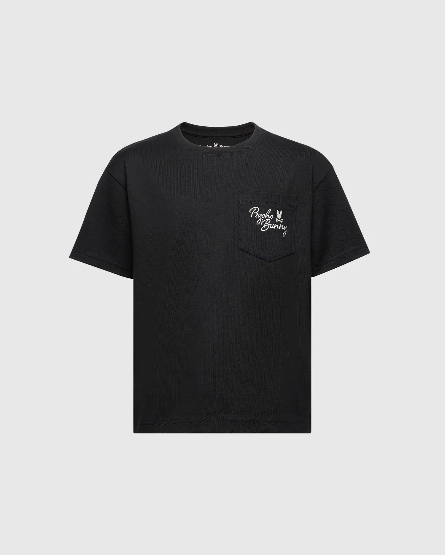 This black heavyweight jersey KIDS DESERT OVERSIZED POCKET TEE by Psycho Bunny features short sleeves and a left chest pocket with "Peace Bunny" in white embroidery, alongside a peace sign and bunny graphic. The light gray backdrop offers a subtle contrast. Product Code: B0U512F200.