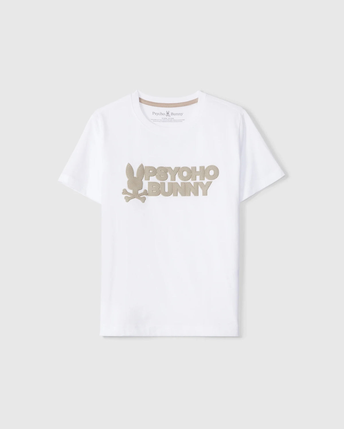 The KIDS MELVIN GRAPHIC TEE - B0U663C200 by Psycho Bunny is a white T-shirt made from Pima cotton, showcasing the text "Psycho Bunny" in large beige letters across the chest. It features a stylized bunny logo with crossed bones underneath, prominently displayed on a plain grey background.