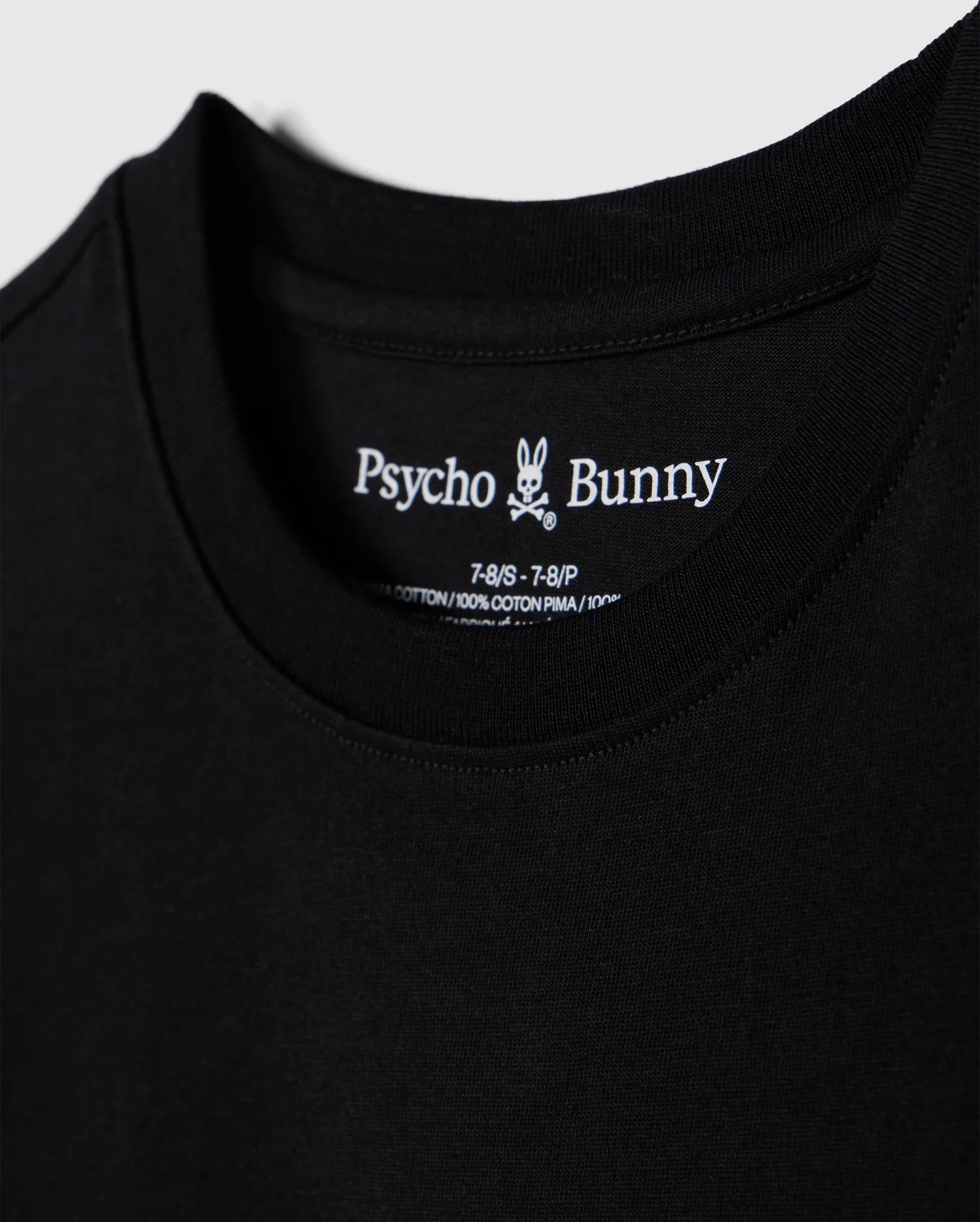 Close-up of a black t-shirt, showcasing the brand name "Psycho Bunny" and a small bunny skull logo inside the collar. Details include shirt size and material info, made from 100% Peruvian Pima cotton. The soft and smooth fabric highlights its premium quality. This particular piece is identified as the "KIDS LOS ANGELES CITY TEE - B0U861A2PC".