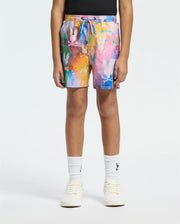 psycho bunny swim trunks feature a vibrant, multicolored geometric print with the iconic bunny skull logo, a drawstring waist, and a relaxed fit.