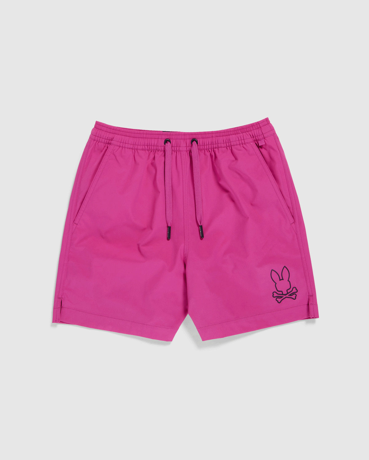 Bright pink quick-drying KIDS PARKER HYDROCHROMIC SWIM TRUNKS from Psycho Bunny, featuring a black drawstring waistband and pockets on each side. These stylish trunks are adorned with the distinctive bunny and crossbones logo on the bottom left side, making them perfect for those sunny beach days.