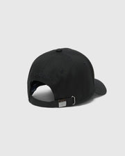 The MENS NEW CASTLE GRAPHIC BASEBALL CAP by Psycho Bunny, made from durable cotton twill, features a metal buckle on the adjustable strap with subtle brand embroidery above the opening. It includes a curved brim and top button for classic style, viewed from the back.