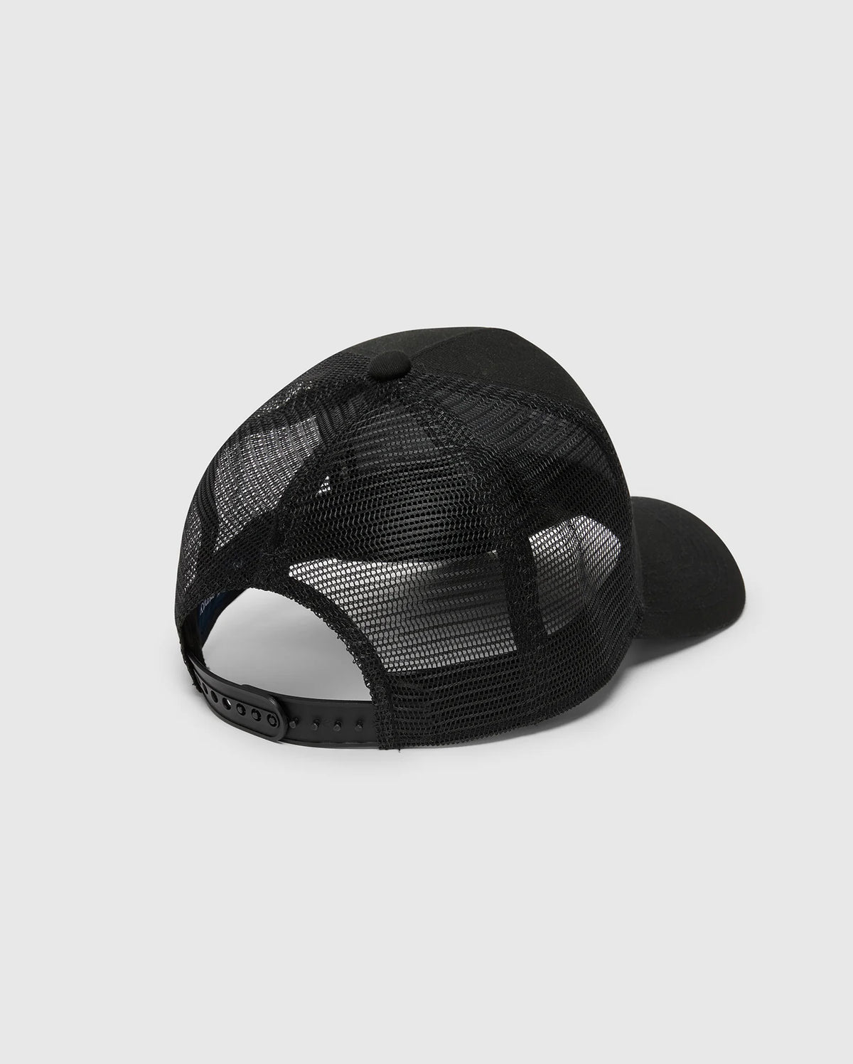 The Psycho Bunny Men's Melbourne Graphic Trucker Hat (B6A548F200) is pictured from the back on a white background, featuring a black mesh panel for ventilation, an adjustable snap-back strap, and a curved bill.