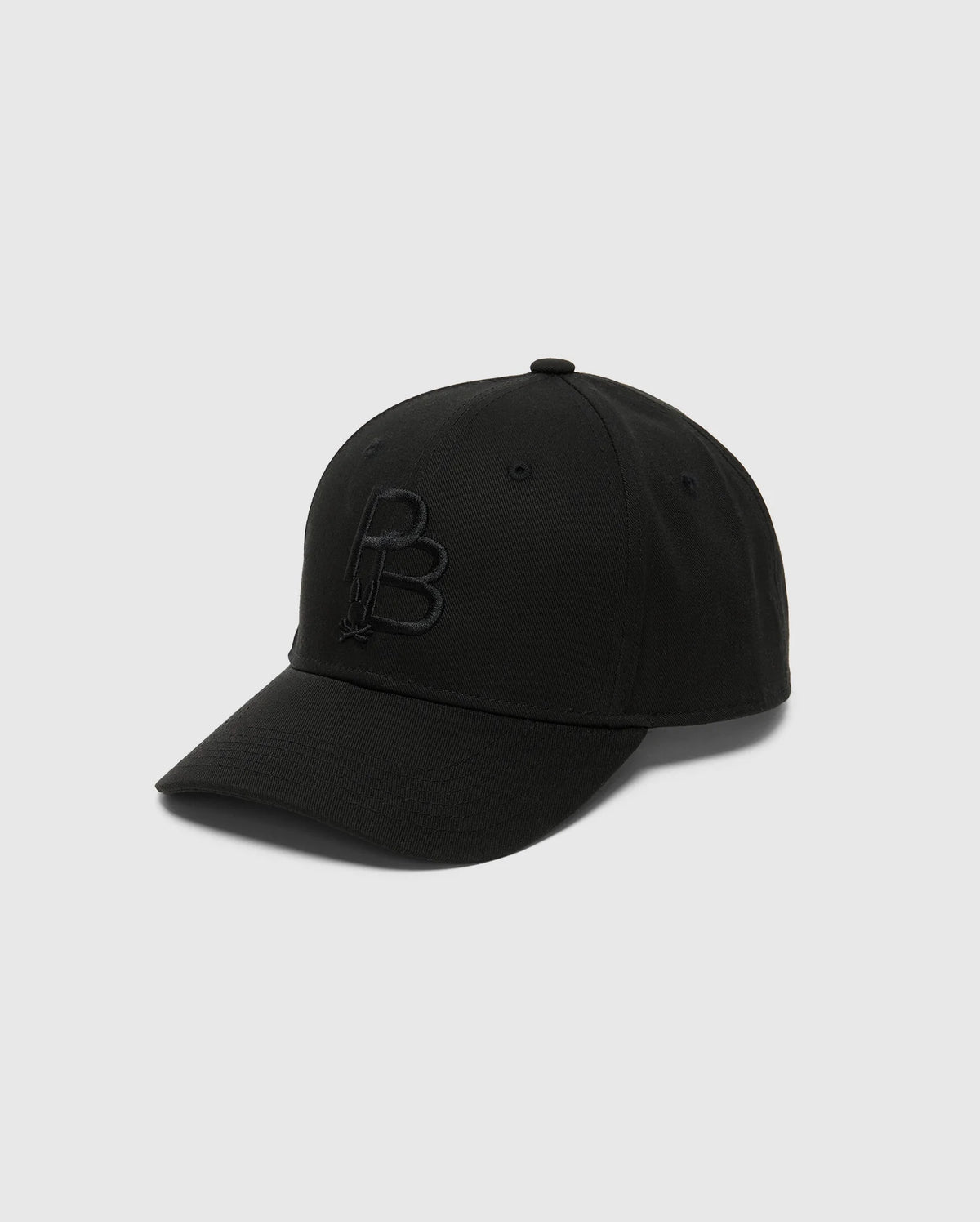 The Psycho Bunny MENS NICHOLSON cap (B6A553F200) features a cotton twill design with an embossed "B" logo on the front, adjustable backstrap, and light gray background, showcasing its stylish front and side views.