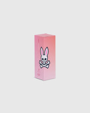 A rectangular box featuring a graphic of a bunny head with crossbones beneath it. The background transitions from pink at the top to light pink at the bottom. The text "3" and "Limited Edition" is visible on the front side, part of the Psycho Bunny 3 PACK GOLF BALLS - B6A565C200 designed to minimize driver spin.