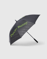 Introducing the GOLF UMBRELLA - B6A624C200 by Psycho Bunny: a stylish black collapsible umbrella adorned with "Psycho Bunny" repeatedly in grey and lime green text. This reliable accessory features a straight black handle and offers superior rain protection with its sleek, modern design.
