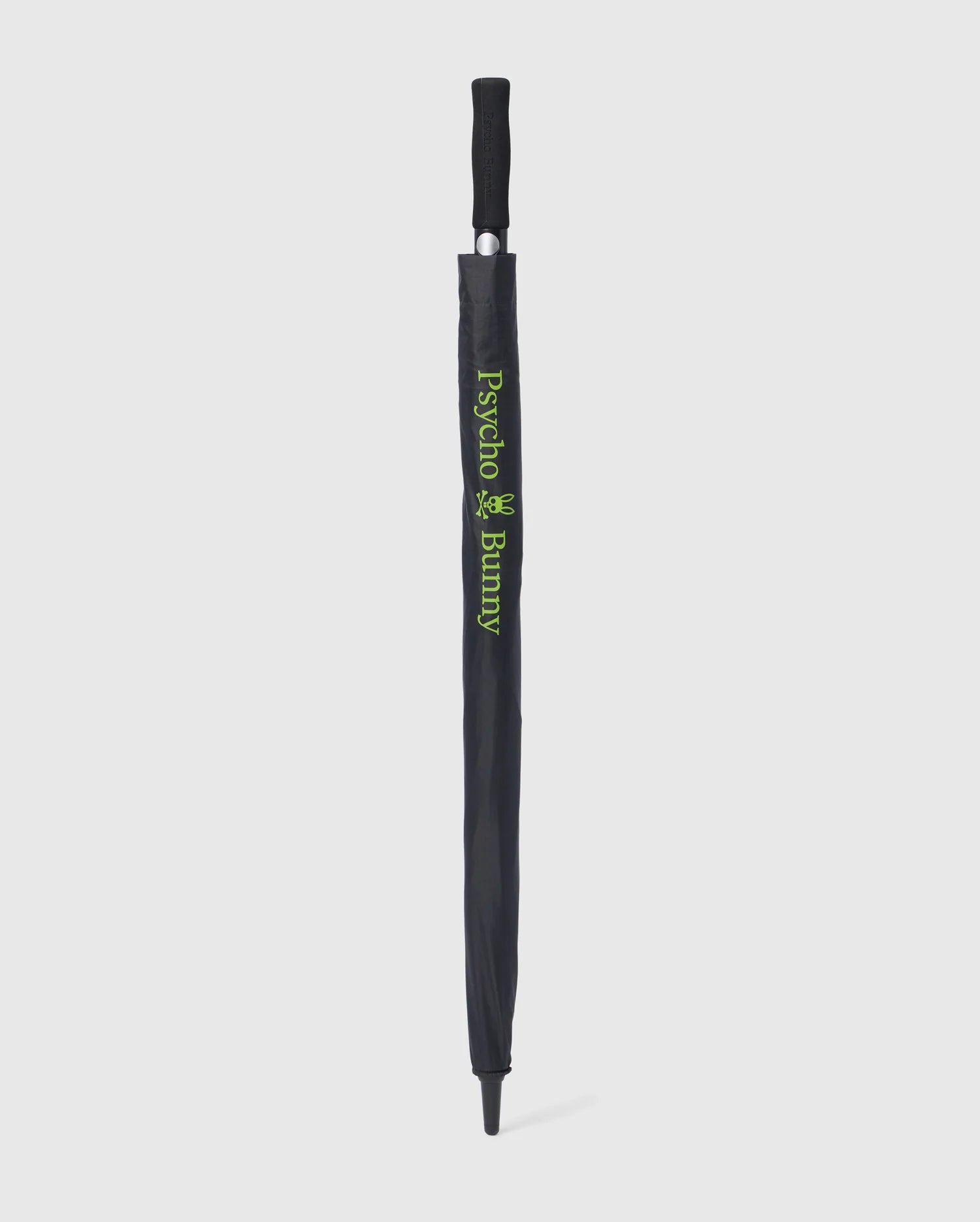 A black GOLF UMBRELLA - B6A624C200 with a matching handle is fully closed and sheathed. The sheath showcases green text and a small graphic, displaying "Psycho Bunny." Renowned for its dependable rain protection, this chic collapsible umbrella by Psycho Bunny stands out against the white background.