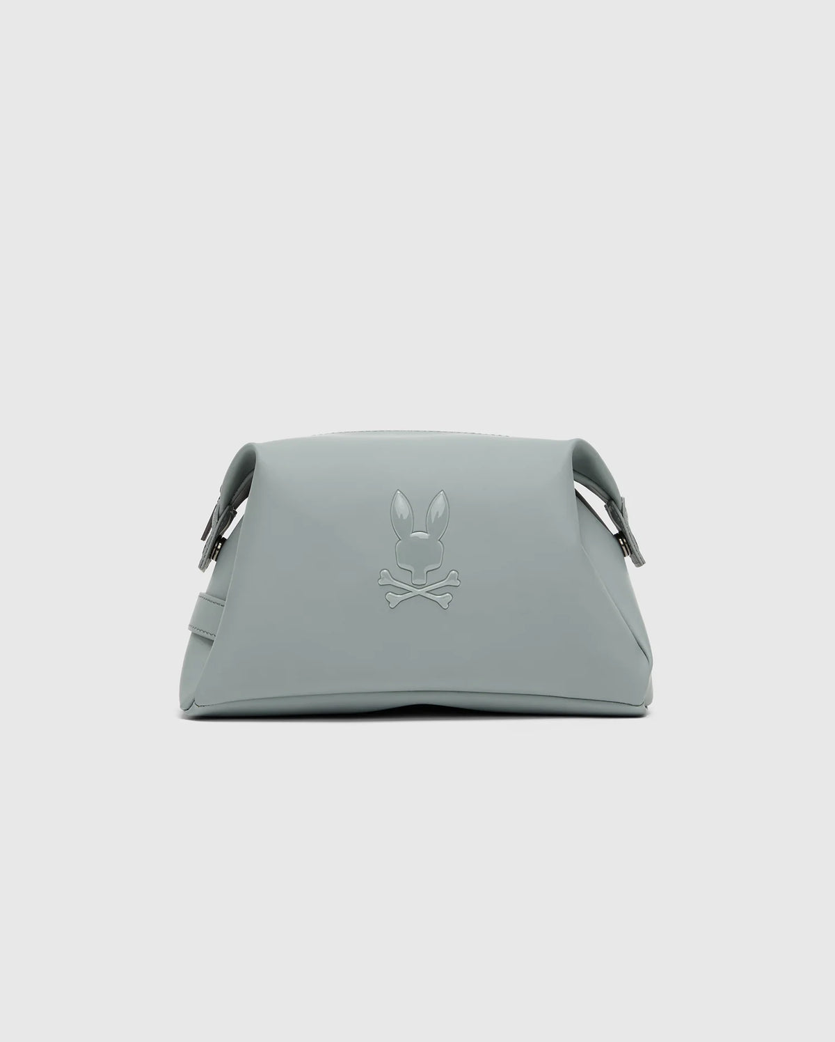 The MENS TOILETRY KIT - B6A636F200 by Psycho Bunny, with its subtle rabbit and crossbones logo, structured shape, curved fold-over top, and metallic fastenings, is perfect for keeping essentials organized for anyone on the go.