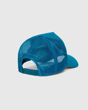 The Psycho Bunny MENS MALTON TRUCKER CAP - B6A797D200, a blue mesh-back trucker cap with an adjustable snap closure, is displayed against a plain white background. Made from 100% cotton, the cap is shown from the back to highlight its mesh ventilation and snap adjustment.