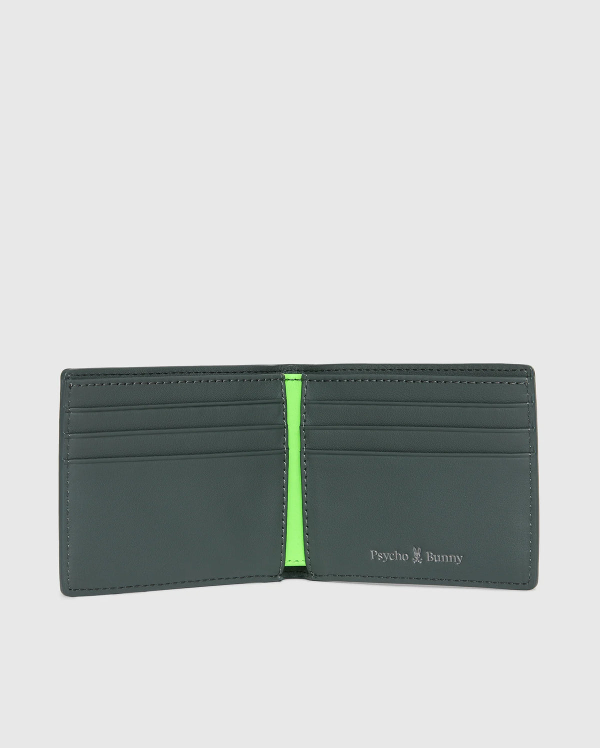 This fashionable MENS WORDMARK LEATHER WALLET - B6A868D200 by Psycho Bunny features a sleek black leather exterior that opens to showcase its chic interior design. It includes multiple card slots and a striking bright green section. The brand name "Psycho Bunny" is proudly embossed on the right, adding a distinctive touch of style to this men's leather wallet.