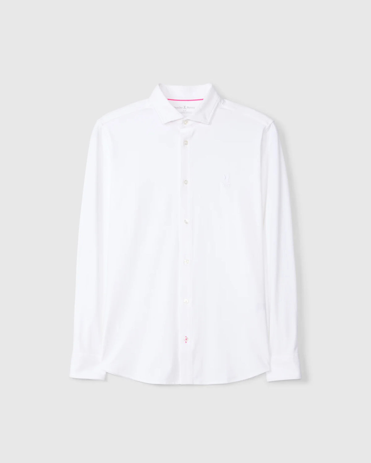 The MENS ARTHUR JERSEY SHIRT - B6C748D200 by Psycho Bunny is presented in a crisp white with a classic collar and long sleeves. Crafted from stretch Pima cotton, it includes a subtle embroidered chest logo. Against a plain gray background, this shirt combines both comfort and elegance.