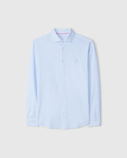 The Psycho Bunny MENS BROOK STRIPED JERSEY SHIRT - B6C750D200 in light blue is displayed against a plain background. This long-sleeve button-up shirt is crafted from Pima cotton and features subtle vertical stripes, a collar, and a small embroidered emblem on the chest. It offers a comfortable fit with white buttons and maintains a clean, crisp appearance.