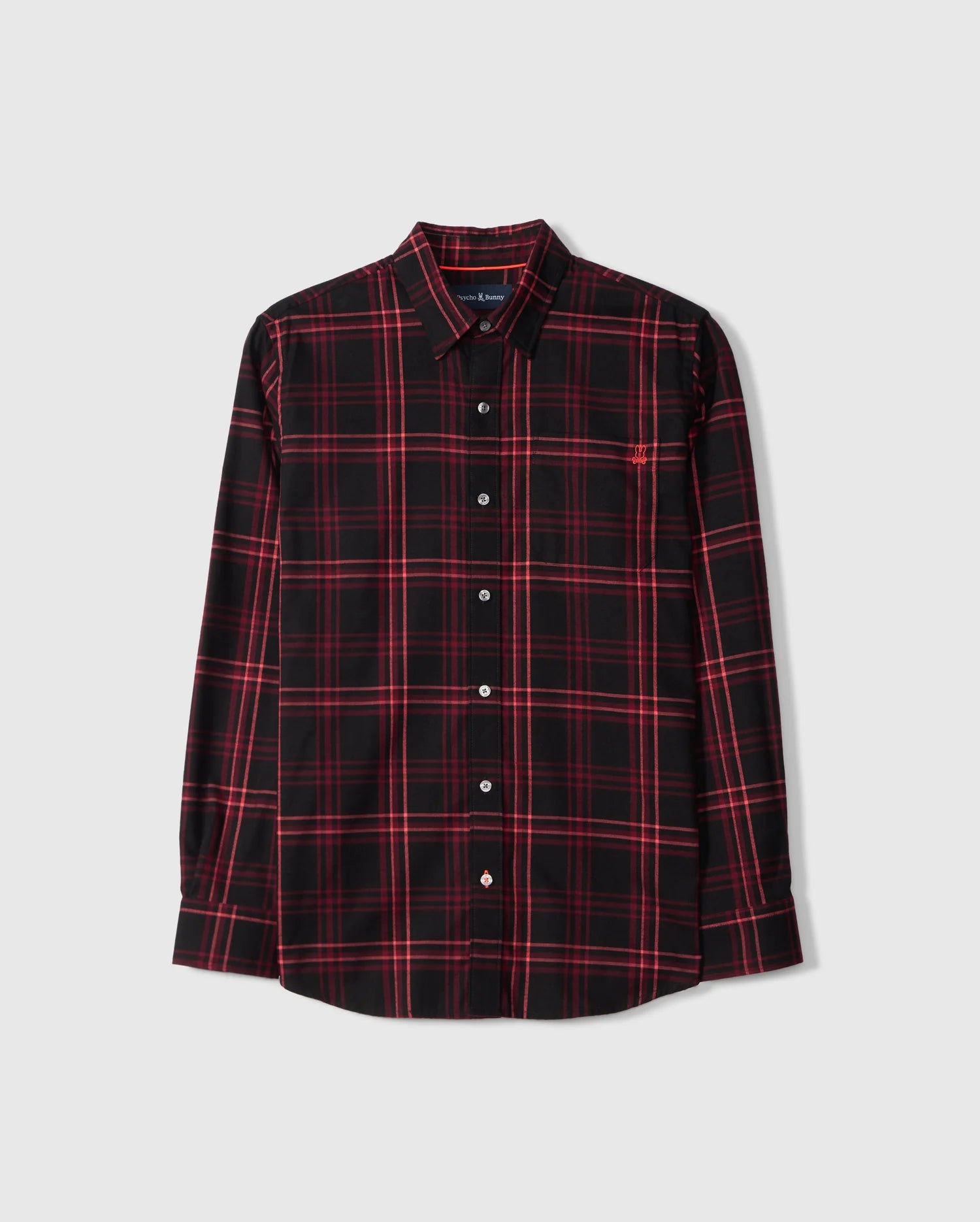The Psycho Bunny MENS HAYES PLAID SHIRT - B6C842D200 is a long-sleeve shirt showcasing a red and black plaid pattern, made from luxurious Pima cotton for ultimate comfort and style.