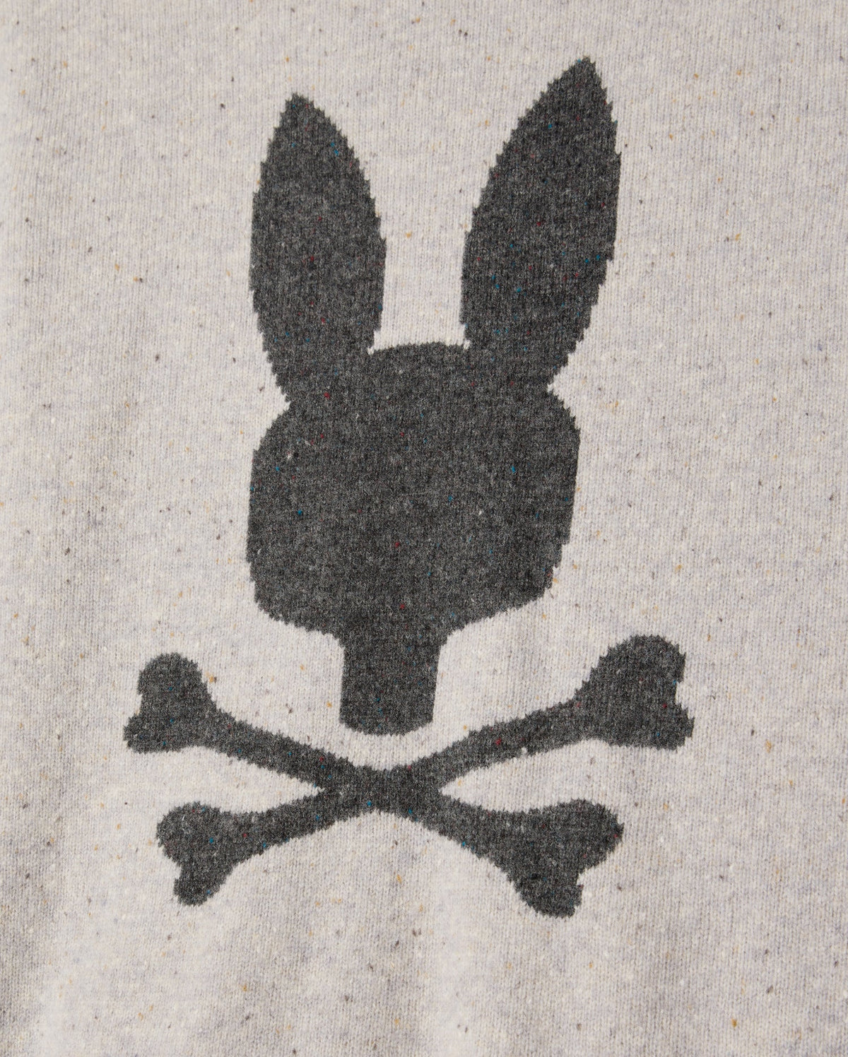 The Psycho Bunny Mens Lincoln Merino Wool Sweater (B6E831D200) features a black silhouette of a rabbit head with long ears above two crossed bones, akin to a skull and crossbones design, printed on a heather gray fabric background, offering a timeless style crafted from luxurious merino wool.