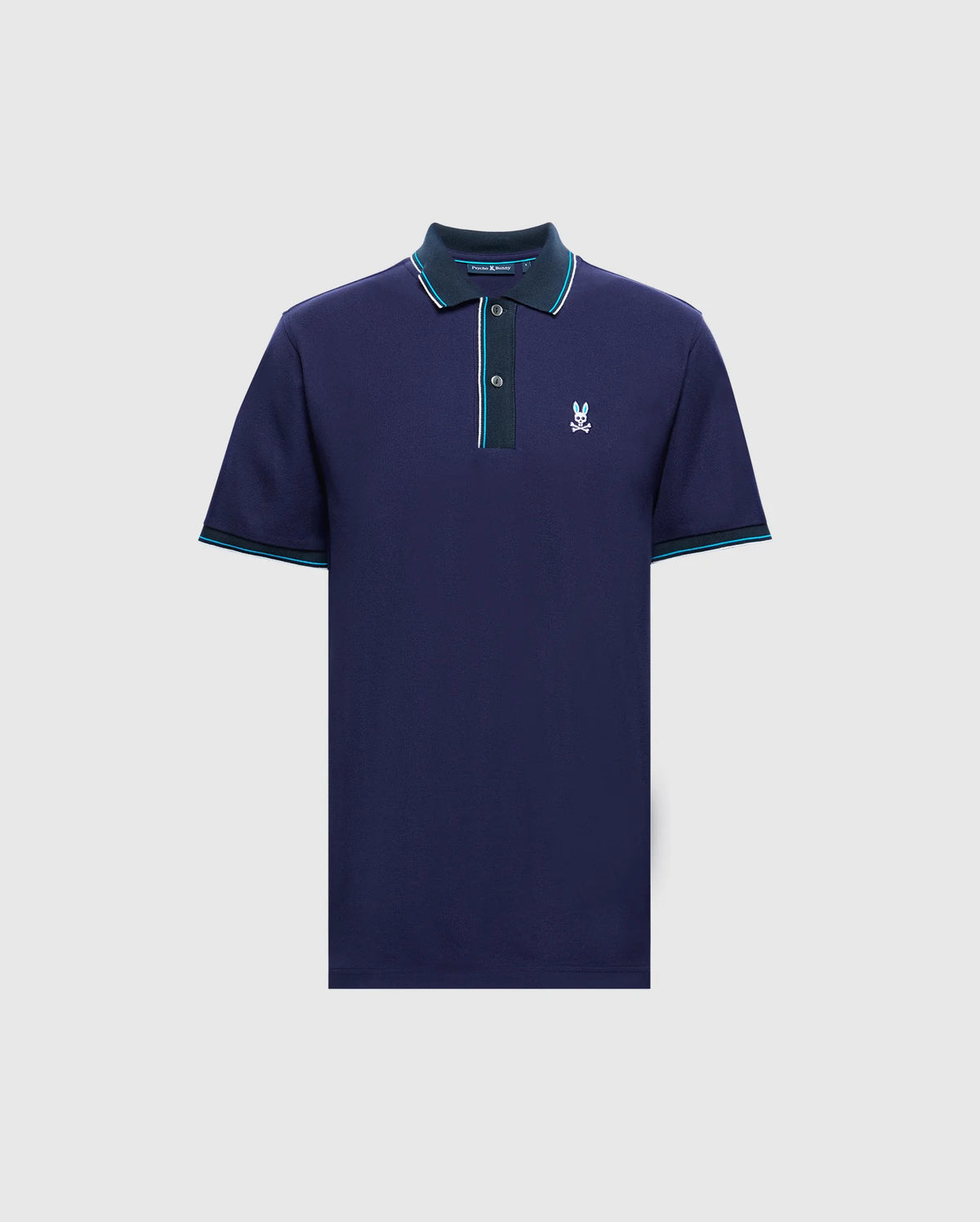 The MENS BRANDON PIQUE POLO - B6K280E200 by Psycho Bunny is a premium quality polo shirt designed for discerning tastes. It features a luxurious cotton pique material in navy blue, complete with a collar and three buttons. The polo is enhanced with subtle turquoise and green trim on the collar and sleeves, while a small embroidered logo on the left chest adds an elegant finishing touch.
