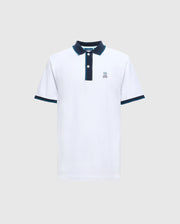 Introducing the Psycho Bunny Men's Brandon Pique Polo - B6K280E200, a luxurious white shirt with a dark collar and sleeve trim. It features a small embroidered logo of a cartoon bunny on the left chest. Designed for both comfort and style, this premium quality polo effortlessly enhances any wardrobe.