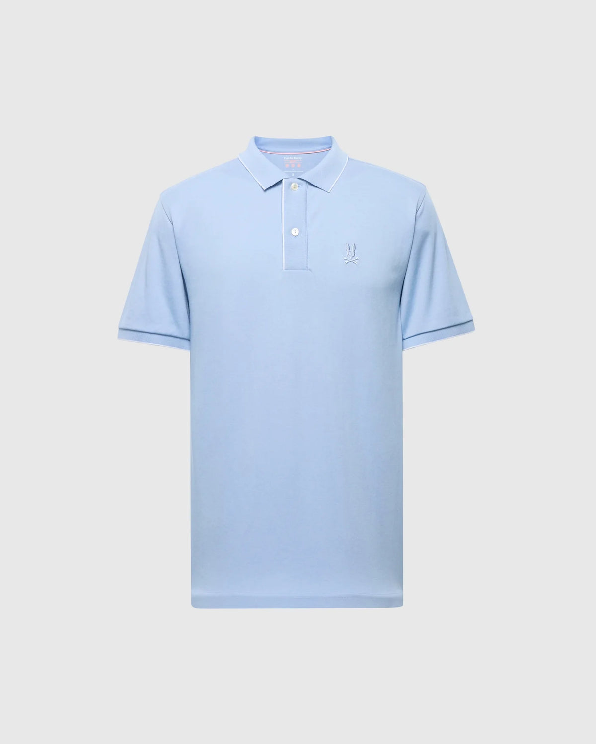The Psycho Bunny MENS BRYCE PERFORMANCE PIQUE POLO in light blue features a moisture-wicking pique fabric, collar, short sleeves, a two-button placket, and a small embroidered logo on the left chest. Set against a plain gray background.