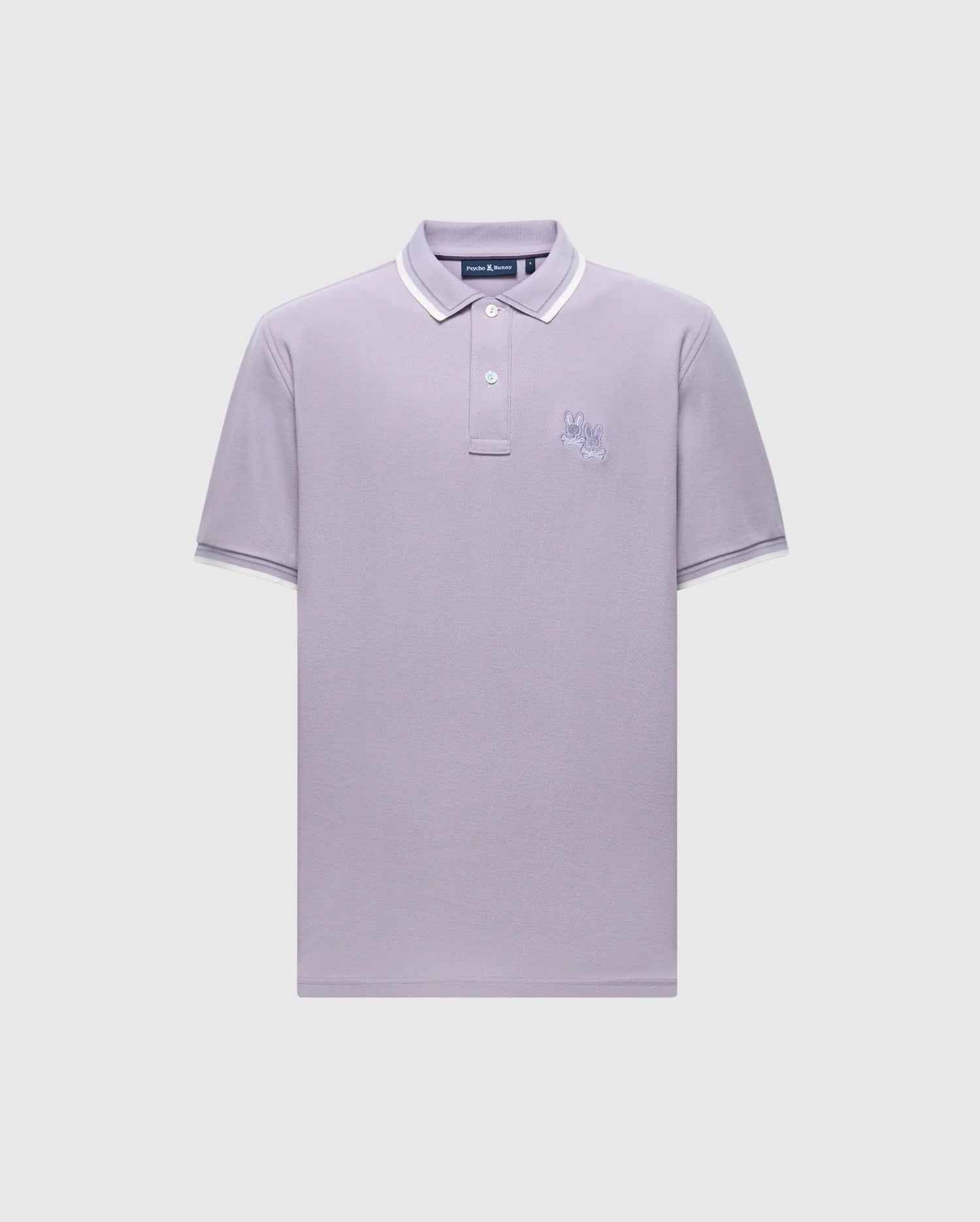 The Psycho Bunny MENS ELLIOT PIQUE POLO - B6K505F200 in light gray features a classic look with a small embroidered chest design, crafted from luxurious Pima cotton, with a classic collar and button placket accented by white on the collar and sleeve edges.