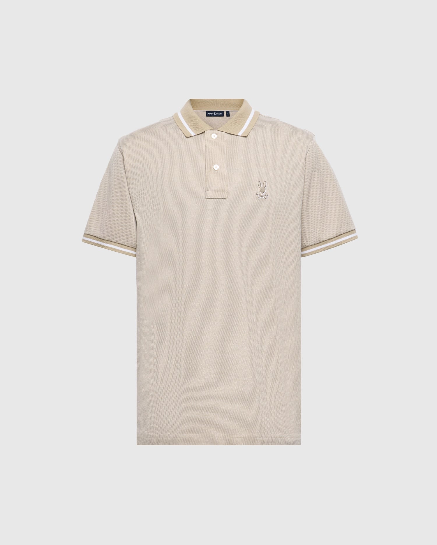 Crafted from luxurious Peruvian Pima cotton, the Psycho Bunny MENS WARSAW JACQUARD PIQUE POLO in beige features short sleeves, a two-button collar, and a small embroidered logo on the left chest. White accents on the collar and sleeve cuffs lend an elegant touch to this timeless piece.