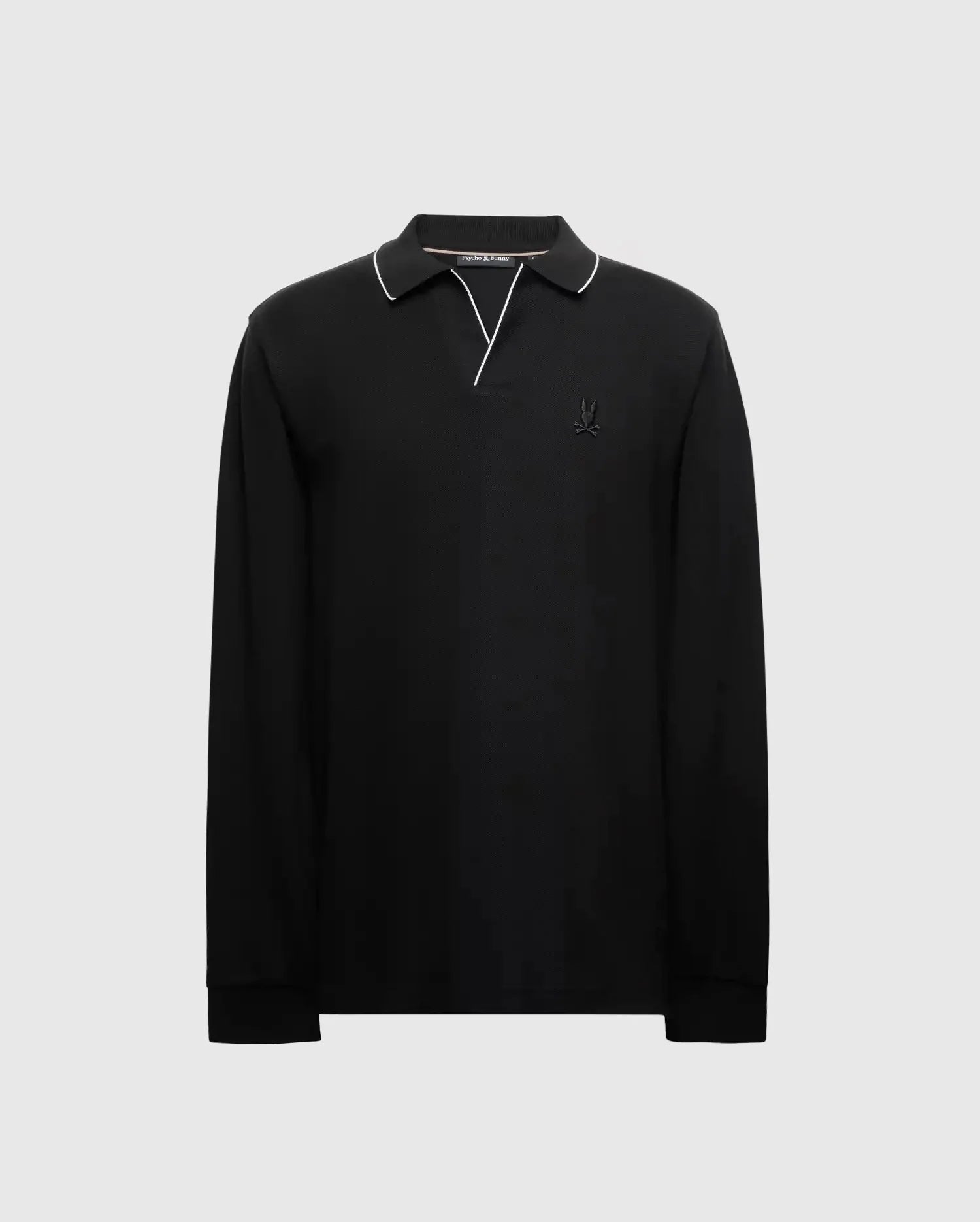 Discover the sophistication of Psycho Bunny's MENS CREEDE PIQUE JOHNNY COLLAR POLO - B6M265E200. This exceptional piece features a unique Johnny collar, crafted from high-quality Pima cotton. The black shirt is accented with a white-trimmed collar and a discreet embroidered logo on the chest, set off by a light gray backdrop.