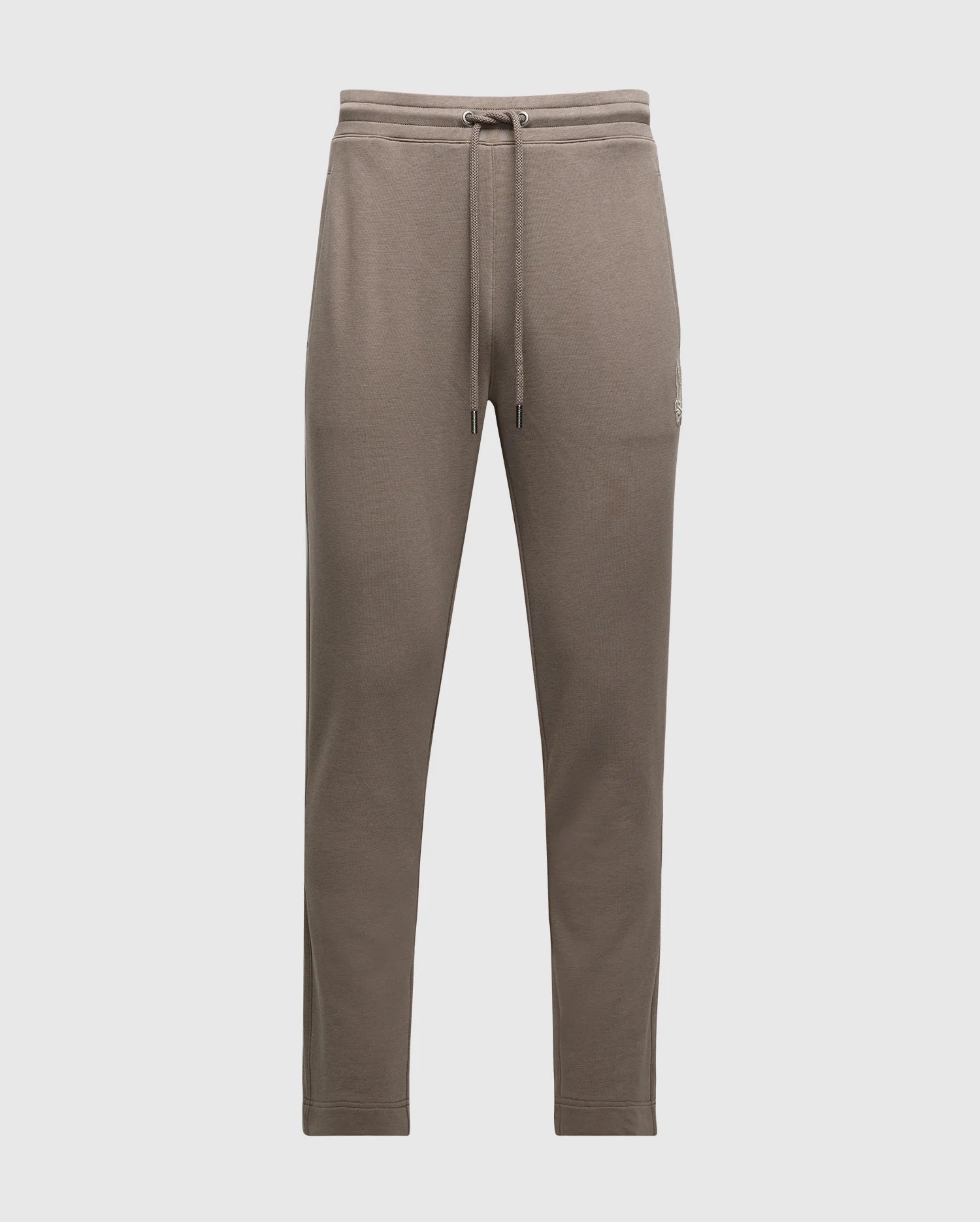 The MENS ALEXANDER SWEATPANT - B6P155E200 from Psycho Bunny is presented against a plain white backdrop. These brown joggers for men boast premium quality cotton, a drawstring waistband, and a simple yet stylish design with tapered legs.