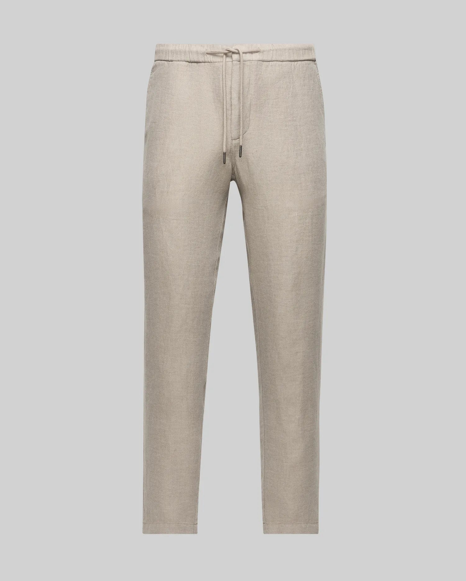 The Psycho Bunny MENS FATE LINEN DRAWSTRING PANT (B6P471C200) features light beige premium linen-blend fabric, elastic waistband with drawstring, straight leg cut, side pockets, and an embroidered logo, shown on a light gray background.