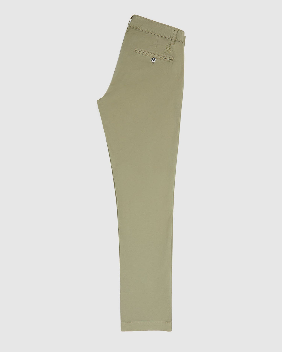 Side view of Psycho Bunny's MENS DELANCY CHINO PANTS - B6P784U1CO, showcasing classic-fit stretch cotton with a flat front and a buttoned back pocket. The khaki chinos are neatly folded against a white background, with waistband and hem aligned.