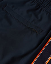 A close-up of the pocket on Psycho Bunny's MENS SONTERRA STRIPE SPORT SHORT - B6R464C200, showcasing the sleek design with quick-drying stretch fabric.