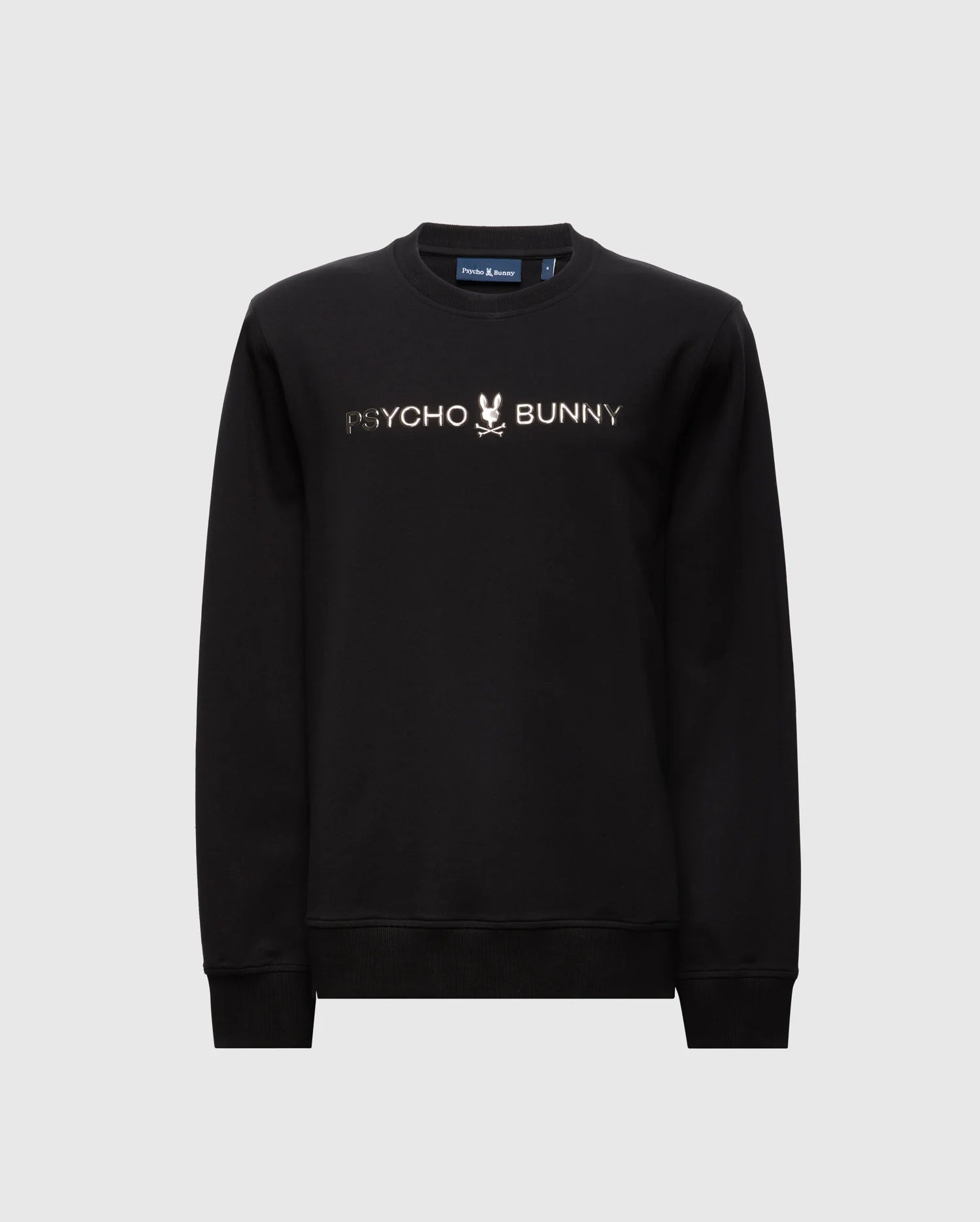 The MENS LAVETA FRENCH TERRY SWEATSHIRT by Psycho Bunny features a trendy black crew style with "Psycho Bunny" and a subtle bunny skull logo at the center. Crafted from comfortable cotton, it showcases a minimalist design that pops against a plain background.
