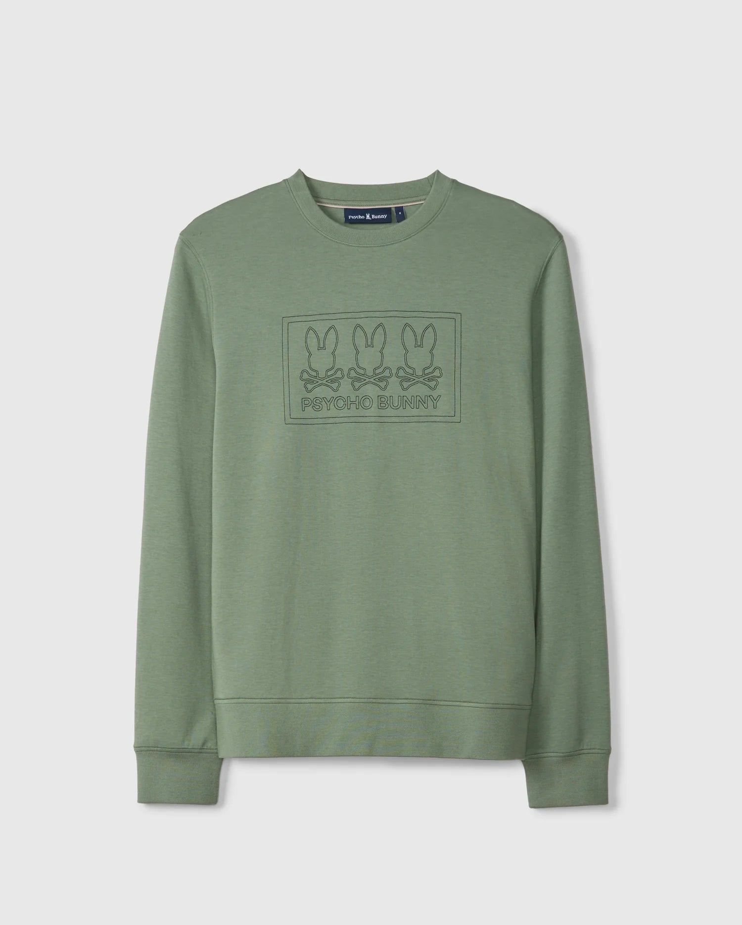 The MENS TACOMA SWEATSHIRT - B6S927D200 from Psycho Bunny offers a blend of luxurious comfort and style with its green crewneck design. It features an embossed pattern of three bunnies above the brand name "Psycho Bunny" on the front, crafted from premium stretch fabric for a perfect fit on any occasion.