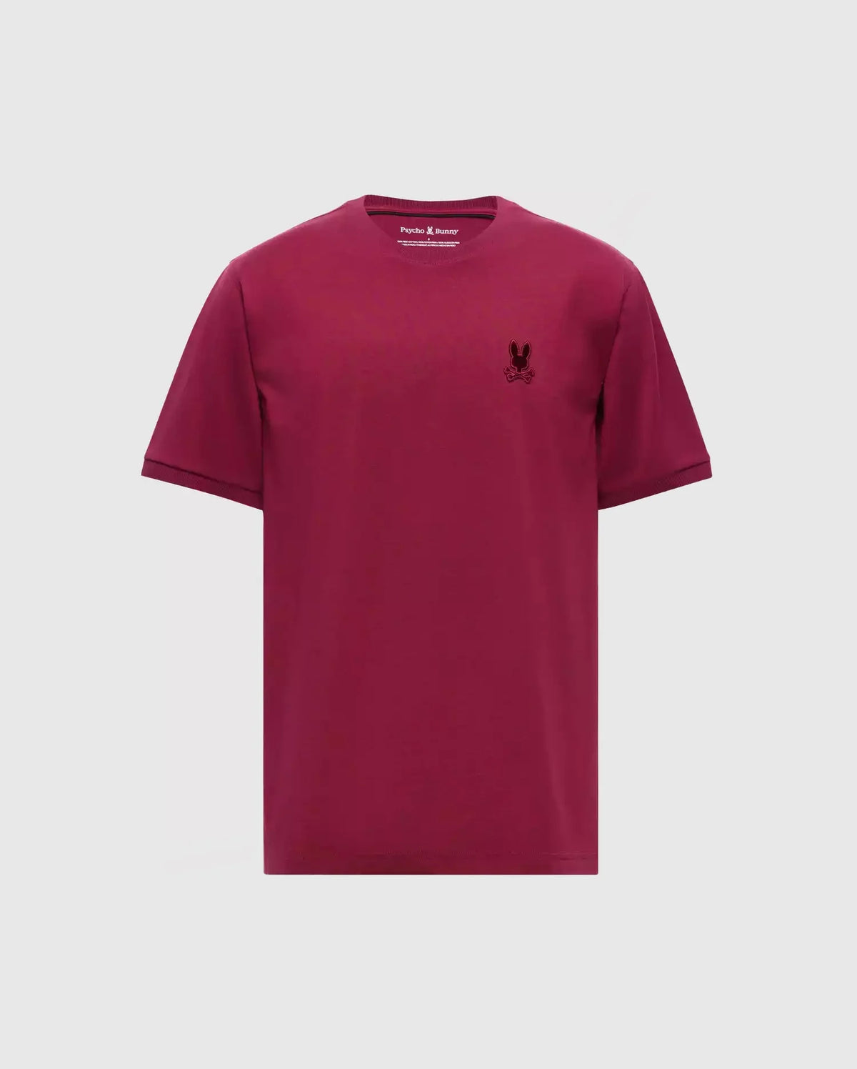 The Psycho Bunny MENS BRANSON FASHION TEE - B6U137E200 is a trendsetting maroon T-shirt made from high-quality Pima cotton, adorned with a subtle embroidered logo on the upper left side. Its plain white background enhances the stylish allure of this lightweight tee.