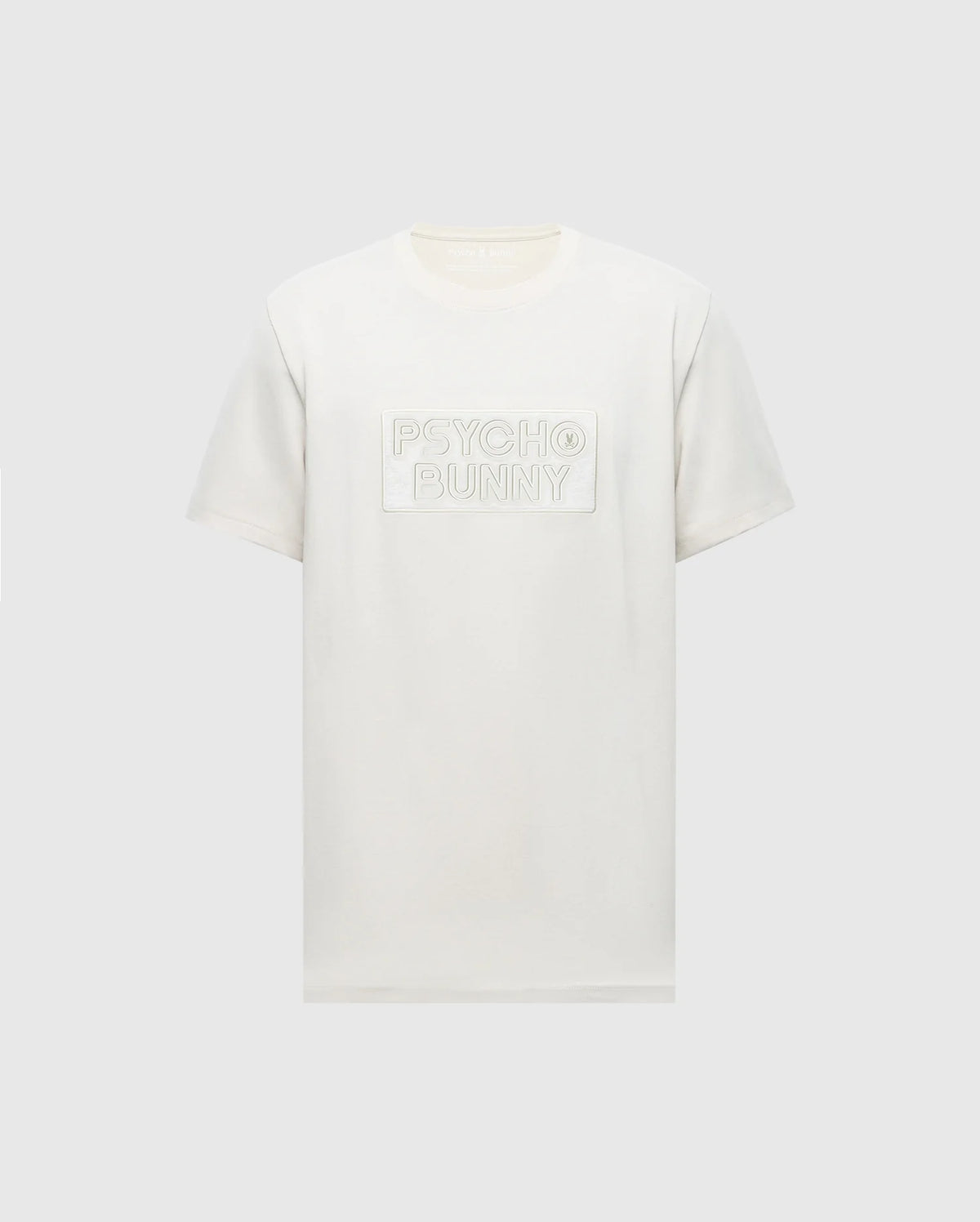 The MENS SYDNEY WORDMARK GRAPHIC TEE - B6U510F200 by Psycho Bunny is a plain white Pima cotton shirt with "Psycho Bunny" embossed on the chest. It features Peruvian craftsmanship, a classic round neckline, and short sleeves, set against a light grey background.