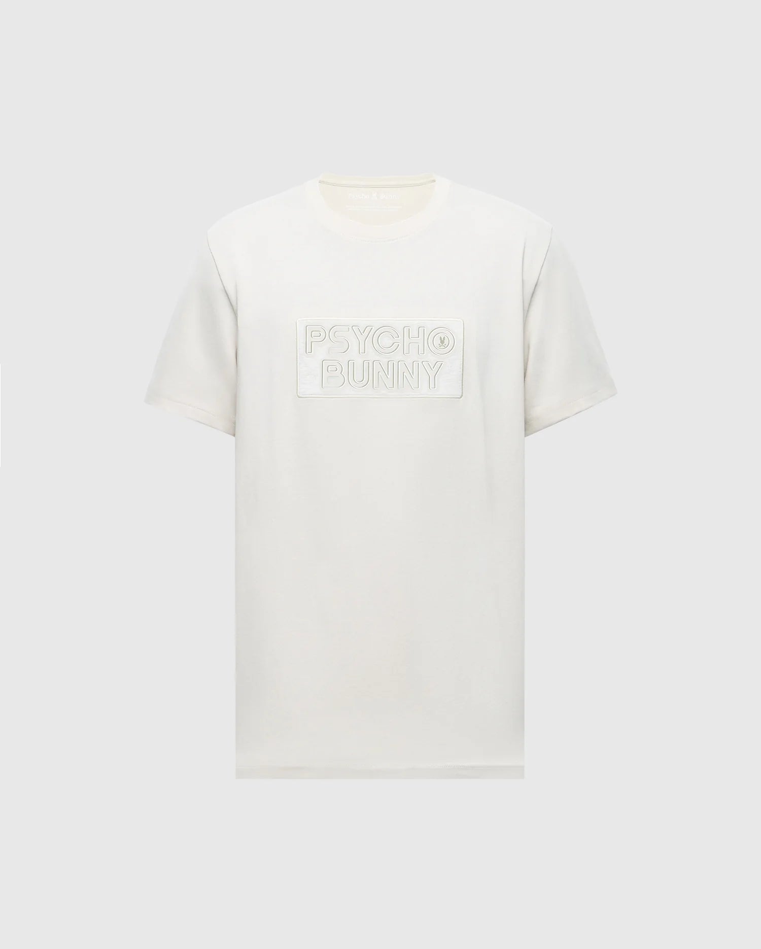 The MENS SYDNEY WORDMARK GRAPHIC TEE - B6U510F200 by Psycho Bunny is a plain white Pima cotton shirt with "Psycho Bunny" embossed on the chest. It features Peruvian craftsmanship, a classic round neckline, and short sleeves, set against a light grey background.