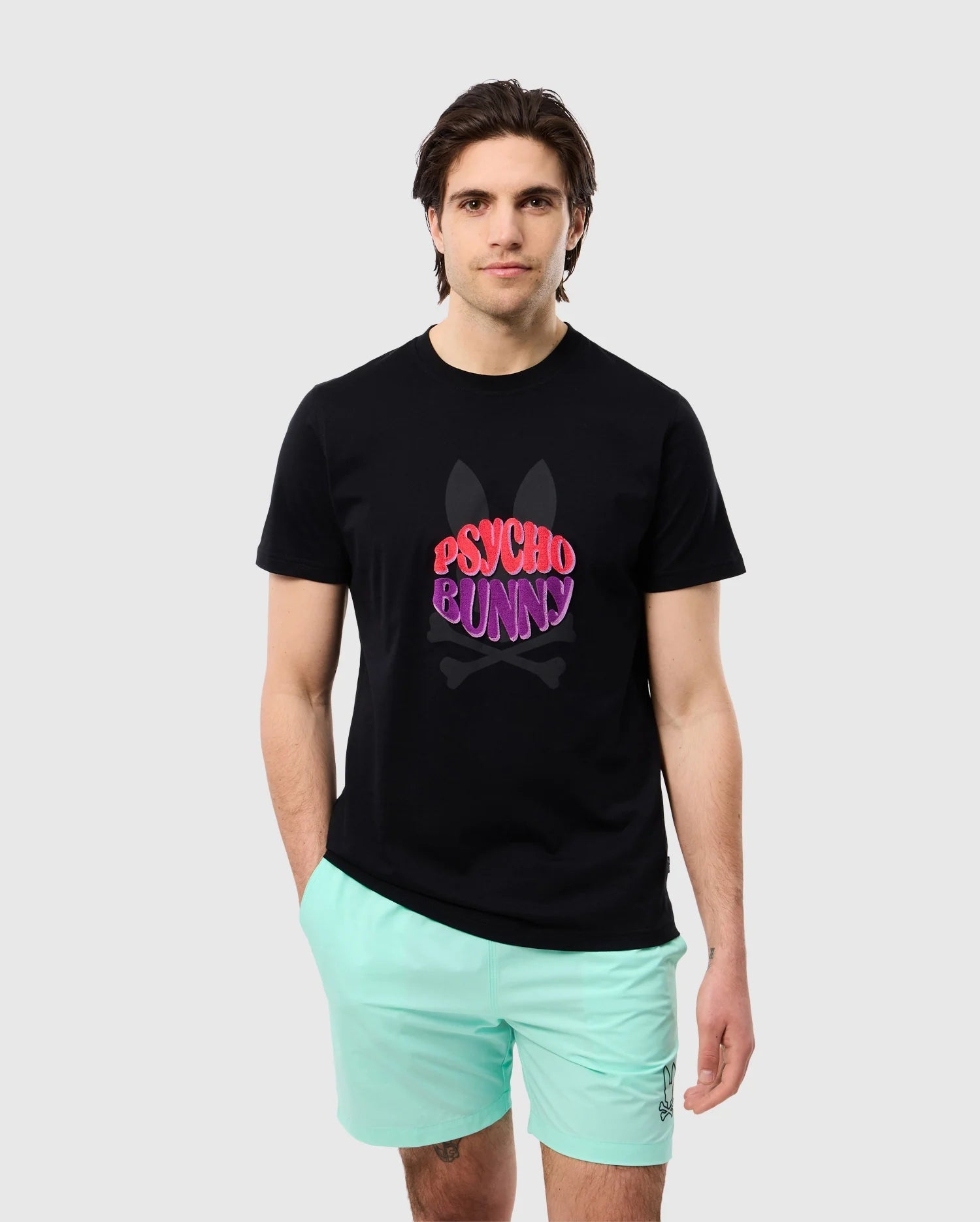 Front view of male model wearing the pima cotton preston graphic tee in black