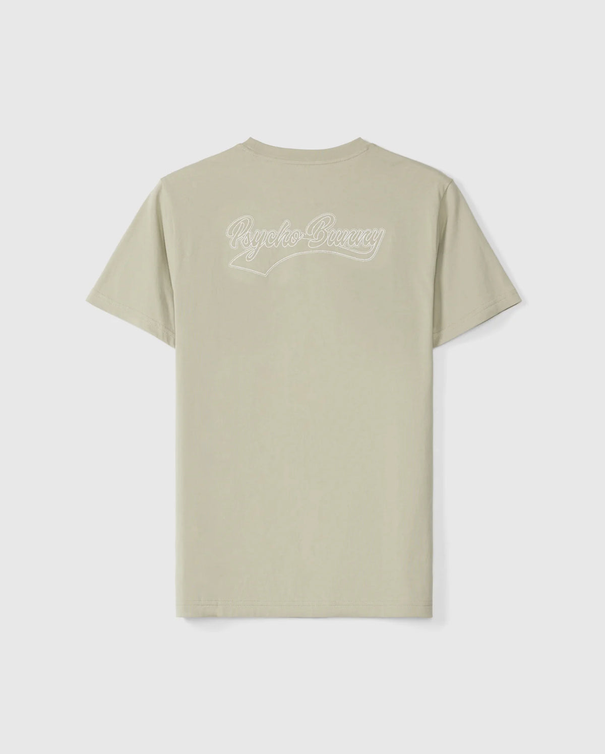 The MENS PEARLAND BACK GRAPHIC TEE - B6U632C200 from Psycho Bunny is a light beige short-sleeve t-shirt displayed on a white background. Crafted from soft Pima cotton, it features the text "Psycho Bunny" in a cursive, white embroidered font on the upper back. This classic crew neck tee offers both style and comfort.