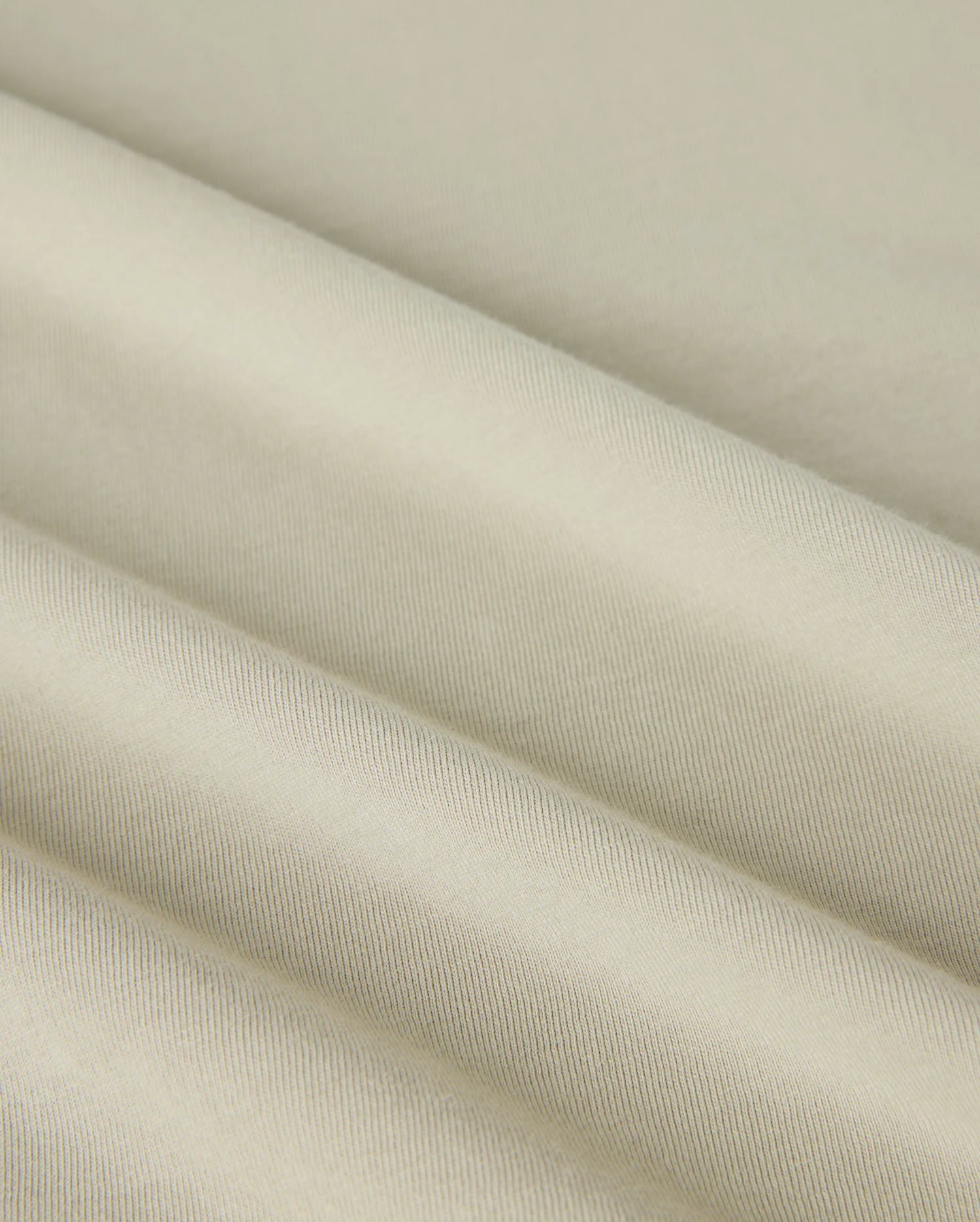 A close-up of an embroidered Mens Pearland Back Graphic Tee - B6U632C200 by Psycho Bunny.