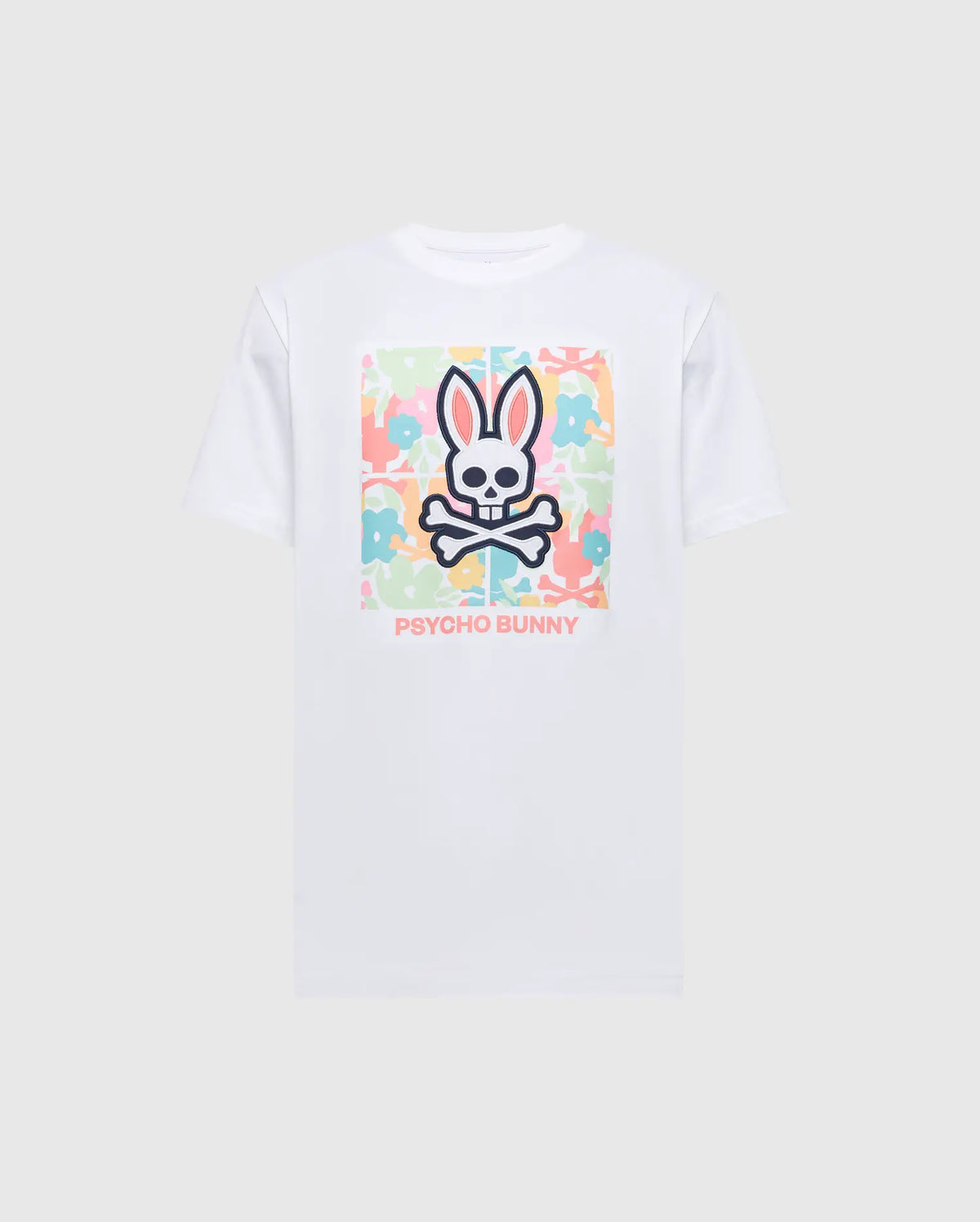 The MENS LEMORA GRAPHIC TEE by Psycho Bunny features a soft Pima cotton white fabric with a colorful rabbit skull and crossbones graphic at its center. The multicolored camouflage background is achieved with water-based print, complemented by "PSYCHO BUNNY" text in pink below.