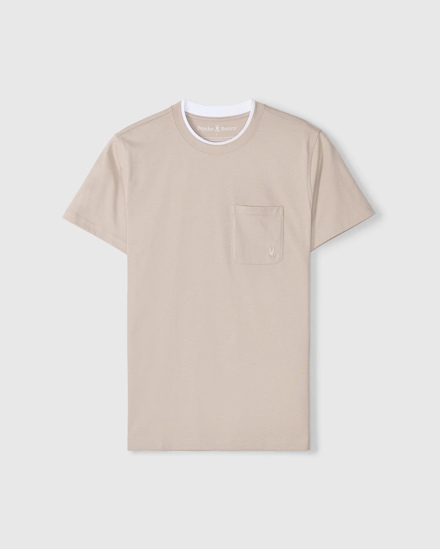 The Psycho Bunny MENS CAMPO POCKET TEE - B6U801D200 is a beige pima cotton shirt with a white crew neck and an embroidered logo on its left-side pocket, set against a light gray background.