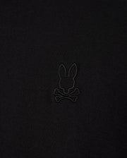 The Psycho Bunny MENS JAMES PREMIUM CREW NECK TEE - B6U952D200 in textured black is made from Premium Pima cotton and showcases a finely embroidered bunny skull and crossbones logo centrally.