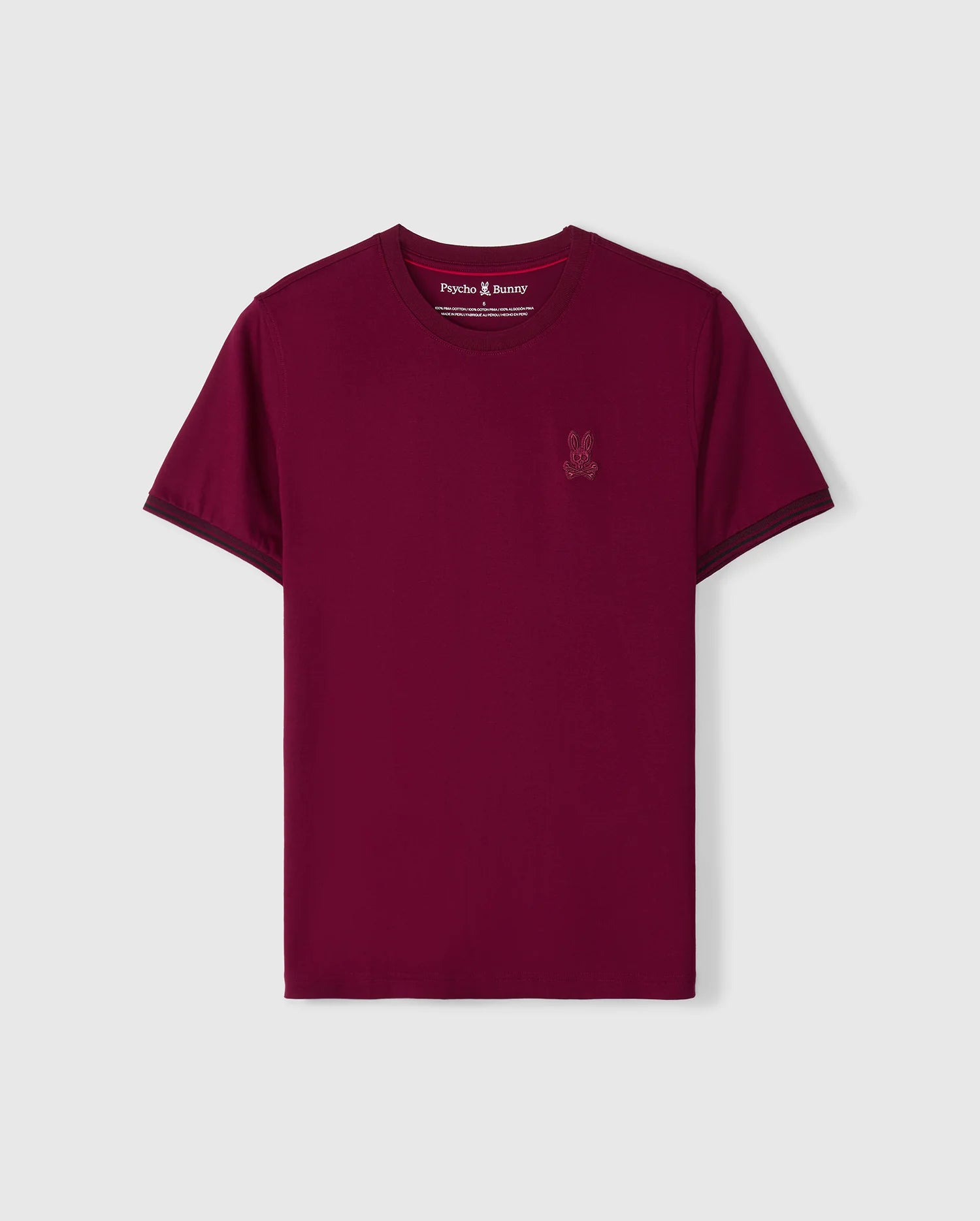 Introducing the Psycho Bunny Men's Malton Fashion Tee (B6U966D200), a chic T-shirt made from soft pima cotton. It features a small embroidered logo on the left chest, set against a light gray backdrop that enhances its vibrant burgundy color.