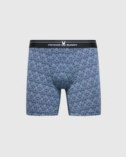 Men's 2 pack boxer briefs from Psycho Bunny feature a blue geometric/skull pattern. Crafted from stretch Pima cotton, they include a black waistband with the "Psycho Bunny" logo and a center bunny emblem for ultimate comfort and style.