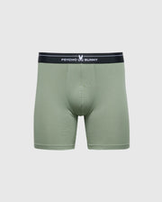 The MENS 2 PACK BOXER BRIEF - B6V481F200 by Psycho Bunny features green Pima cotton-Modal blend boxer briefs with a stretchy design for all-day comfort, accented with a black waistband adorned with a white bunny logo and "Psycho Bunny" text.