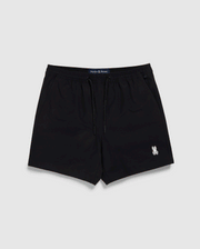 Black Psycho Bunny swim trunks with a drawstring and a small white logo on the left leg, displayed against a white backdrop. The label "Jack & Jones" is visible on the waistband.
