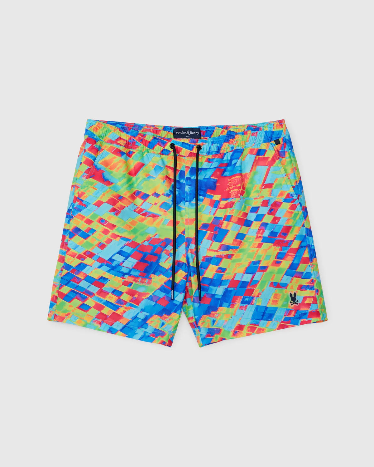 The Psycho Bunny MENS DENNIS ALL OVER PRINT SWIM TRUNK - B6W530C200 is a pair of vibrant, multicolored swim trunks with an abstract pixelated pattern featuring blue, red, green, and yellow hues. Made from quick-dry fabric, these trunks have an elastic waistband with a drawstring and a small embroidered logo on the lower left leg.