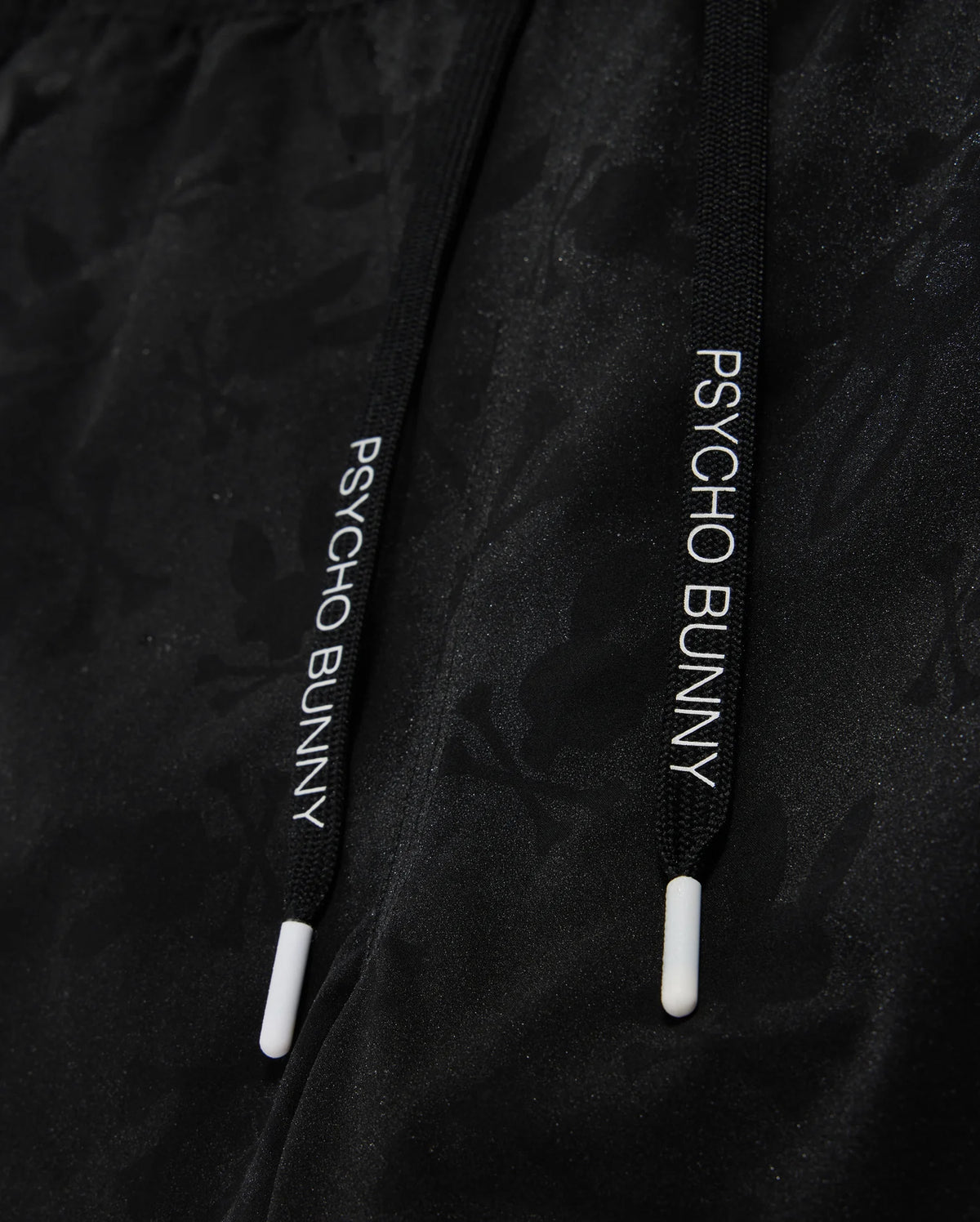 drawstring detail of parker hydrochromic swim trunk