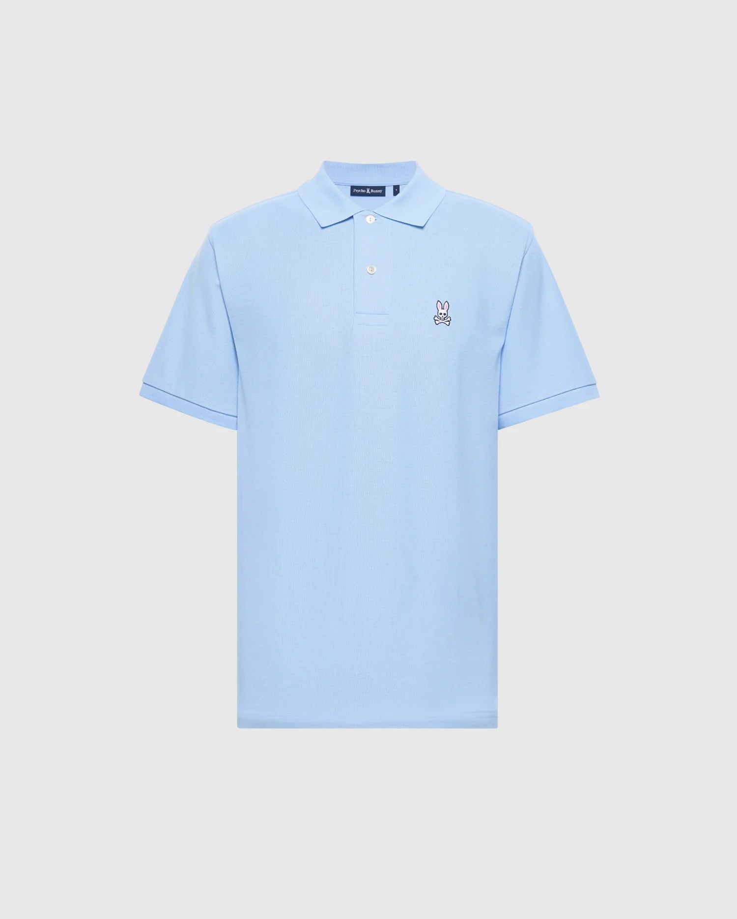 The Psycho Bunny BIG AND TALL CLASSIC PIQUE POLO - B9K001CRPC in light blue boasts a small bunny wearing sunglasses embroidered on the left chest. Made from premium fabric, it features short sleeves and a classic collar with a three-button placket.