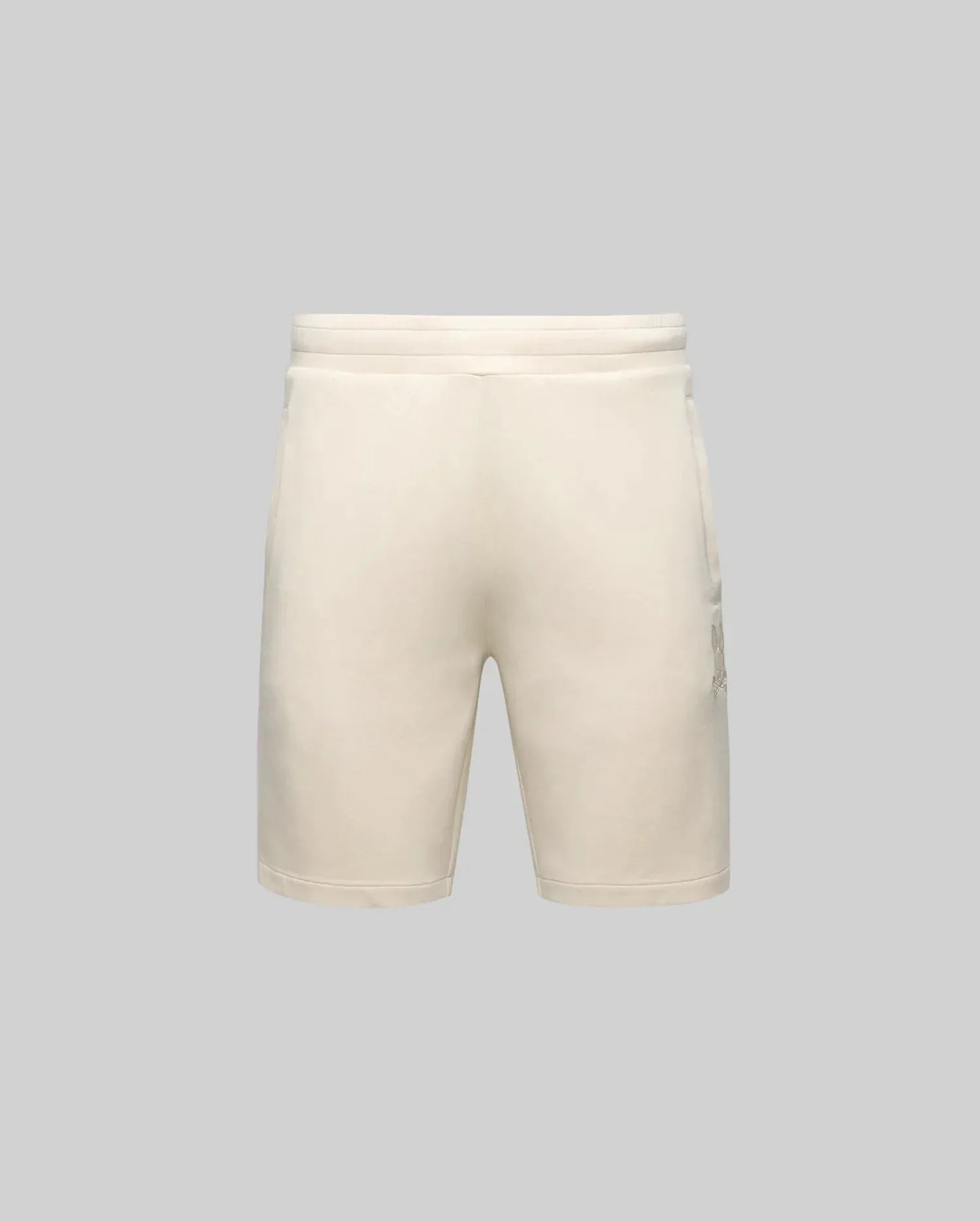 The Psycho Bunny MENS LAZSLO SWEATSHORT (MB0900016) features a beige, simple design with stretch modal-cotton-blend fabric, elastic waistband, side pockets, and embroidered Bunny detail, shown on a plain gray background.