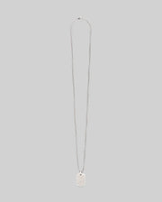 The Psycho Bunny MENS ARMY TAG NECKLACE - MO1700021 features a silver rectangular dog tag pendant on a steel cable chain, shown against a plain light gray background.
